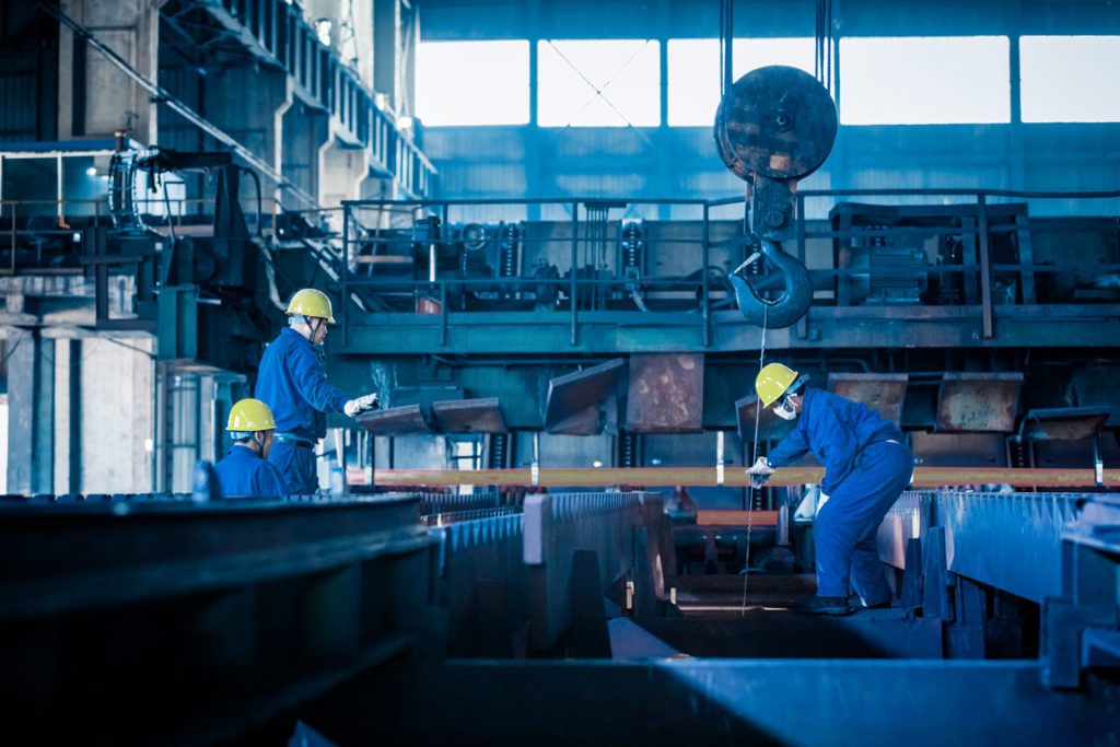 Workers Installing Cart System.