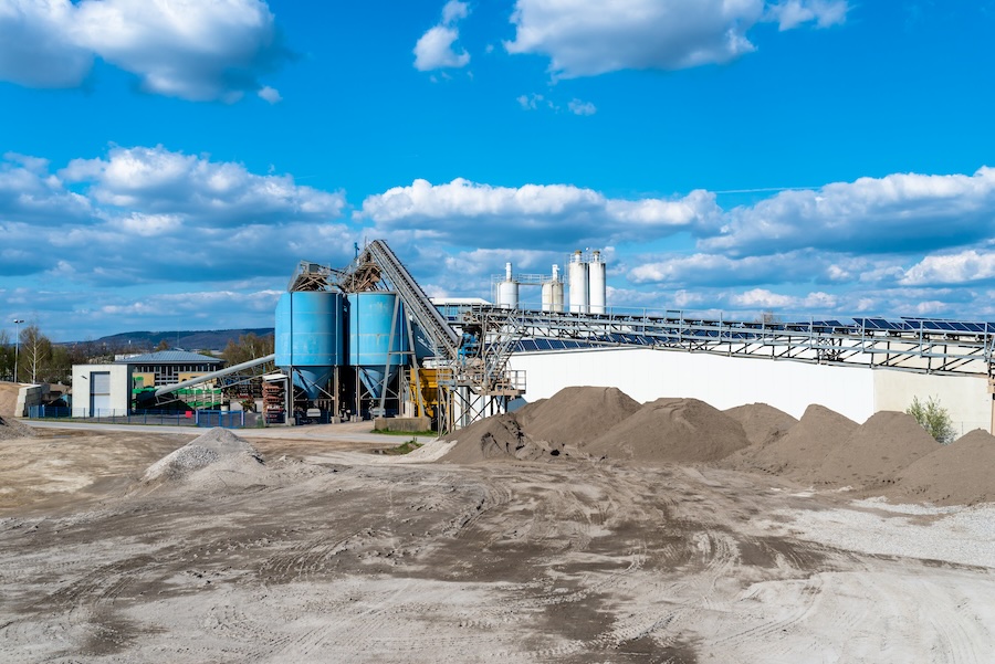 Piles of gravel at a cement manufacturing plant.